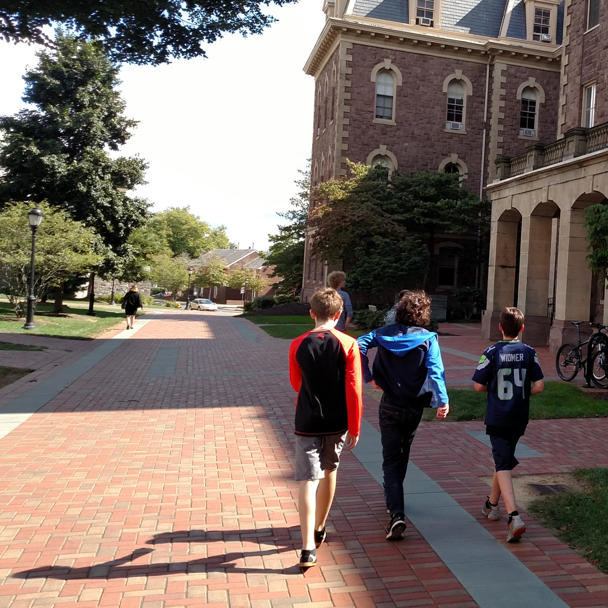 Three RLC members strolling around campus