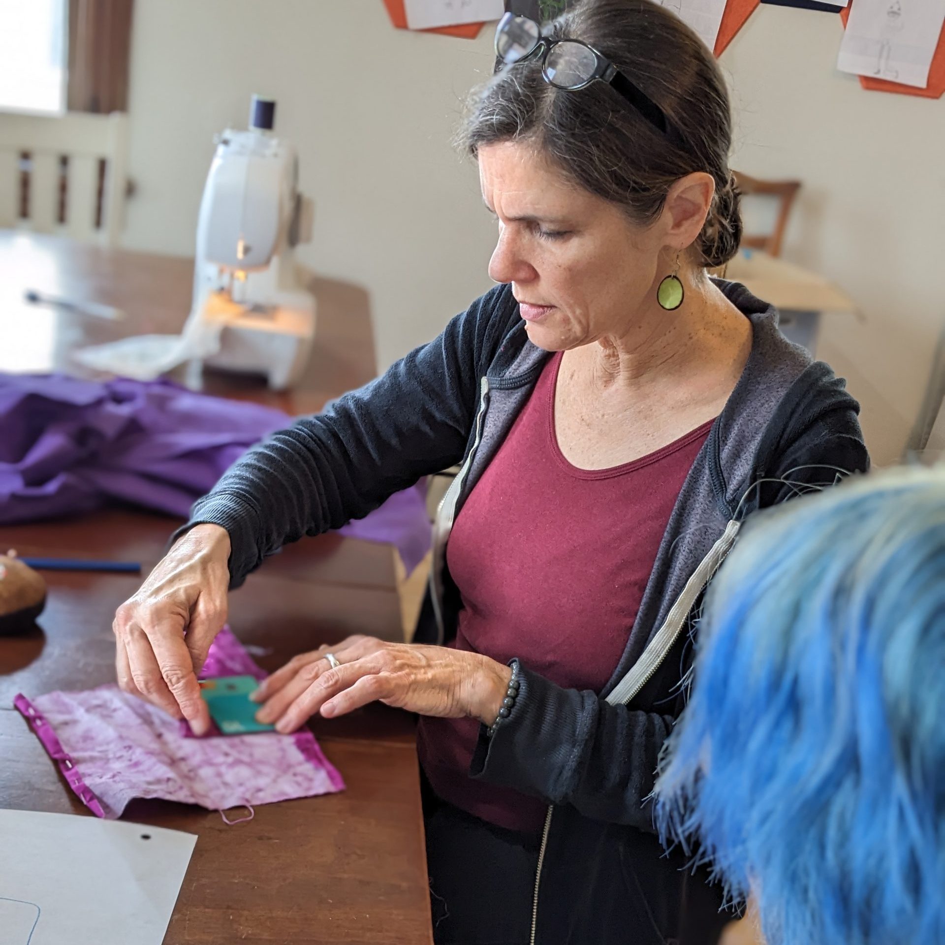 MaryBeth working on a craft in Make Stuff class